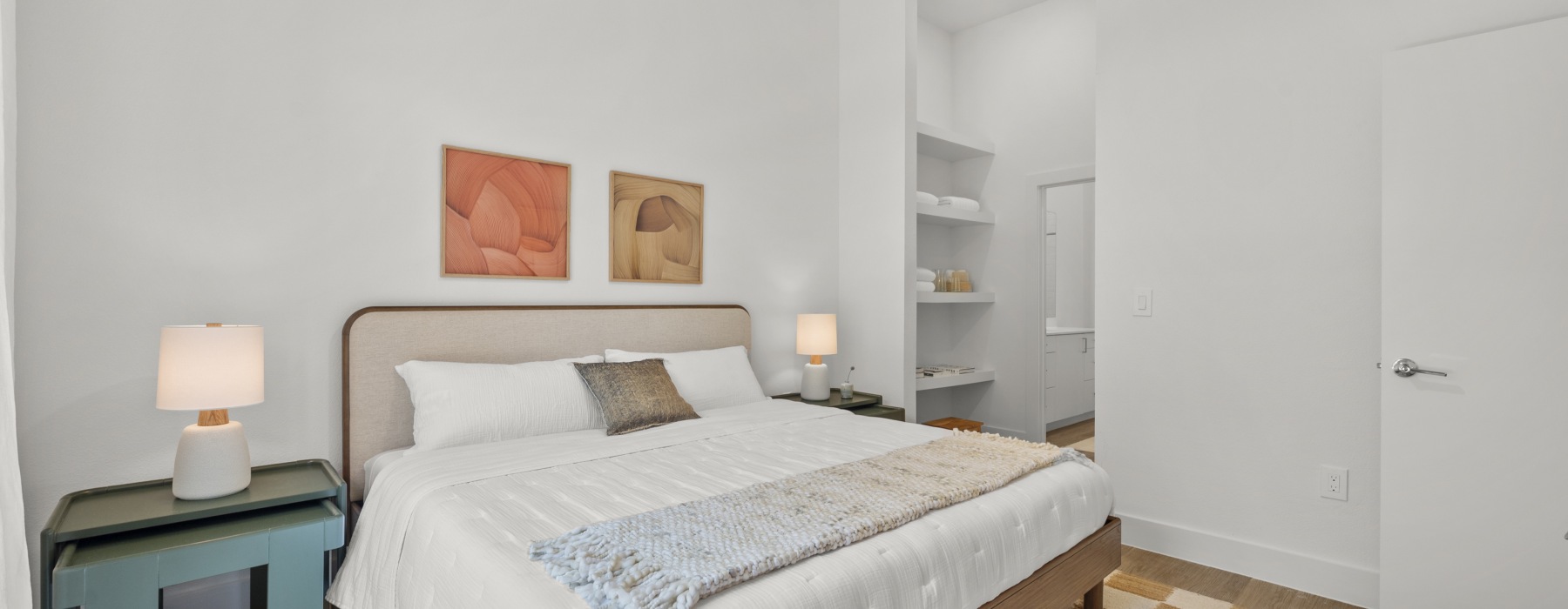 decorated bedroom with side tables and large bed