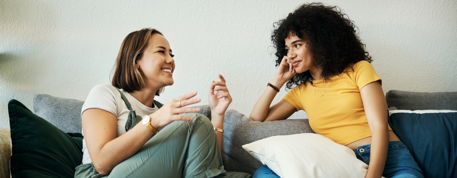 Friends talking on a sofa